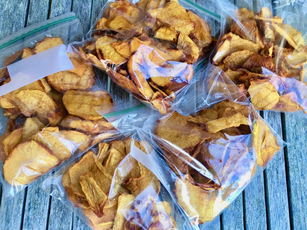 several bags of portioned out dehydrated peaches