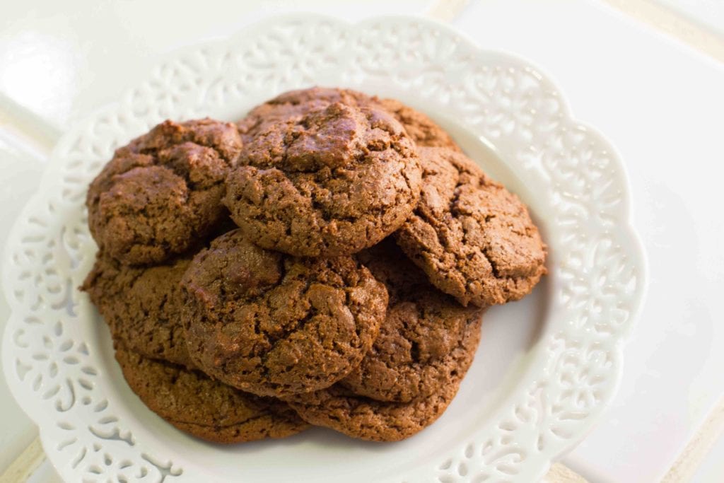 gluten free molasses cookies on vintage white plate